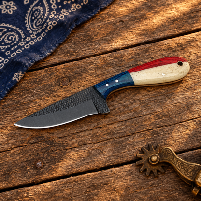 Dark-bladed knife on ranch wagon planks